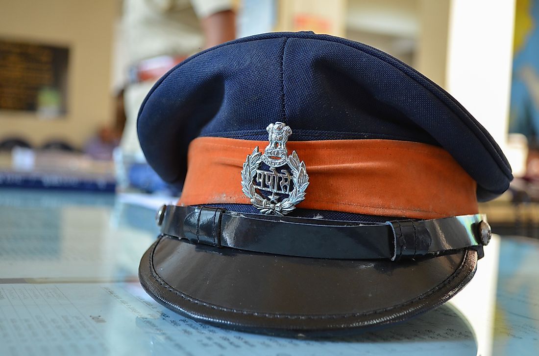 The police hat of a Mumbai officer. Phot credit: Yvdalmia / Shutterstock.com.