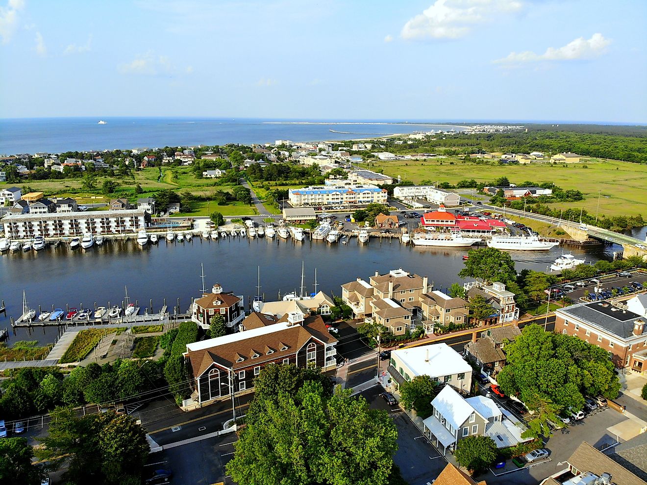 Aerial view of Lewes, Delaware, fishing port, waterfront homes along canal. Editorial credit: Khairil Azhar Junos / Shutterstock.com