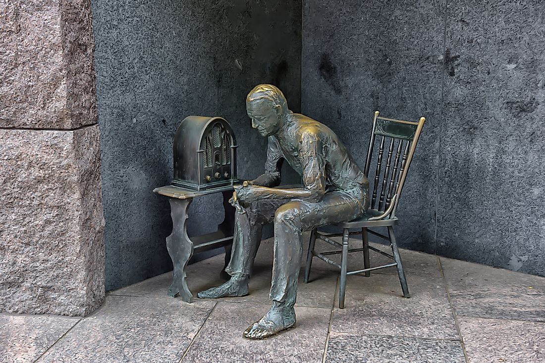 Sculpture at the Franklin Delano Roosevelt Memorial in Washington DC depicting a listener of FDR's fireside chats.  Editorial credit: Evdoha_spb / Shutterstock.com