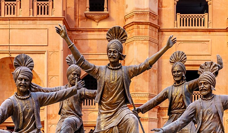 A statue of Punjabi dancers in India. 