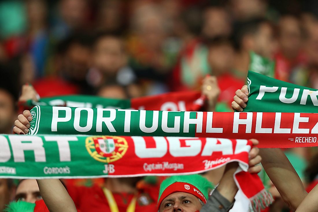 Portuguese fans at a football match. Image credit: Marco Iacobucci EPP/Shutterstock.com.