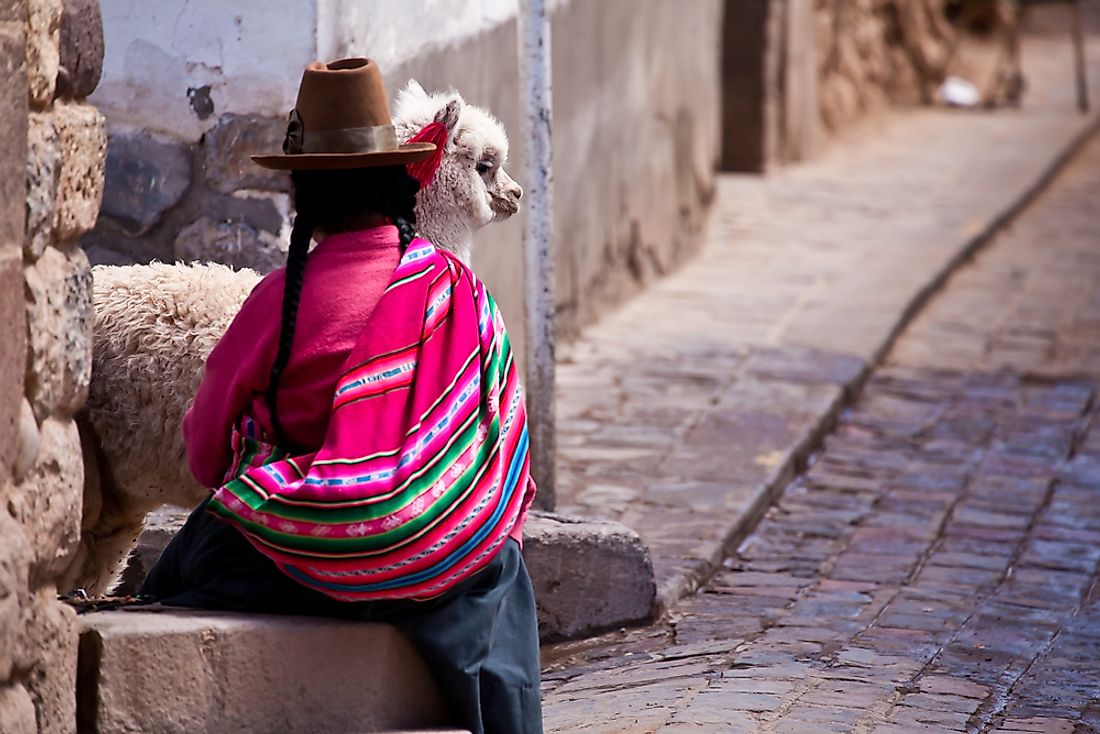 A woman in traditional clothes in Cuzco, Peru. 