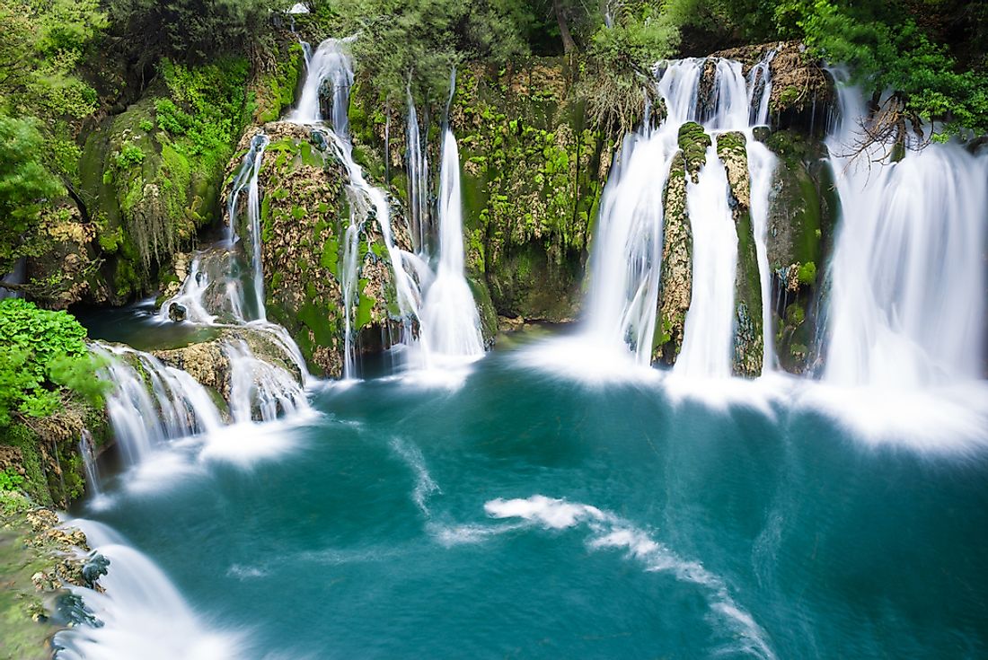 A scenic view of a waterfall in the Una National Park of Bosnia and Herzegovina.