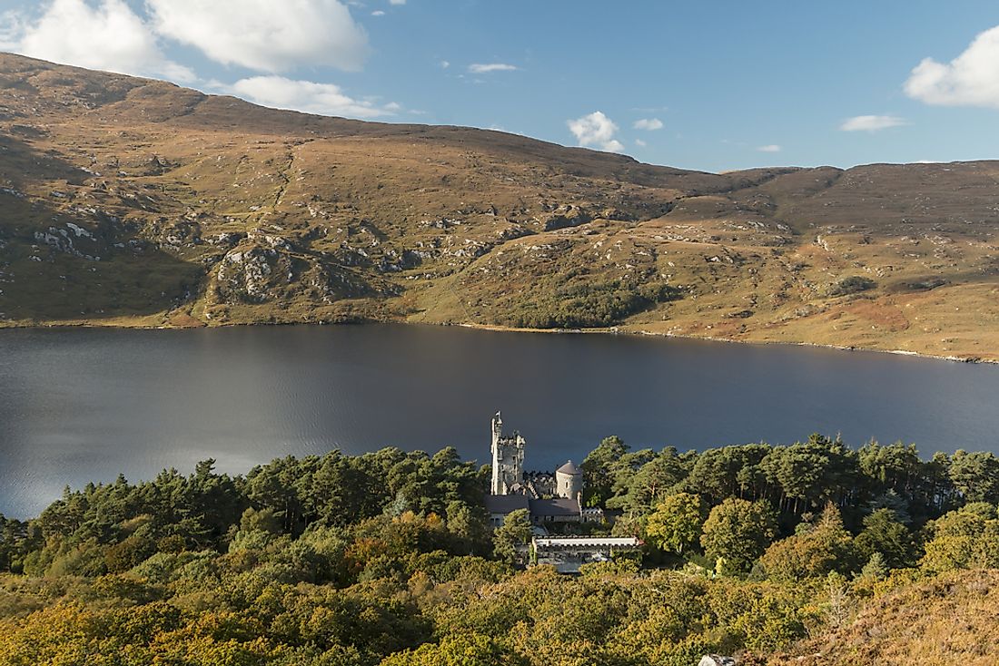 Glenveagh Castle and Loch in Glenveagh National Park along Ireland's Wild Atlantic Way tourism trail. 