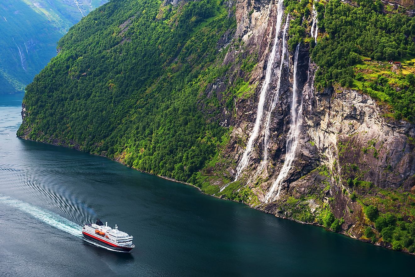 Breathtaking view of Sunnylvsfjorden fjord and famous Seven Sisters waterfalls, near Geiranger village in western Norway. Image credit: Smit/Shutterstock.com