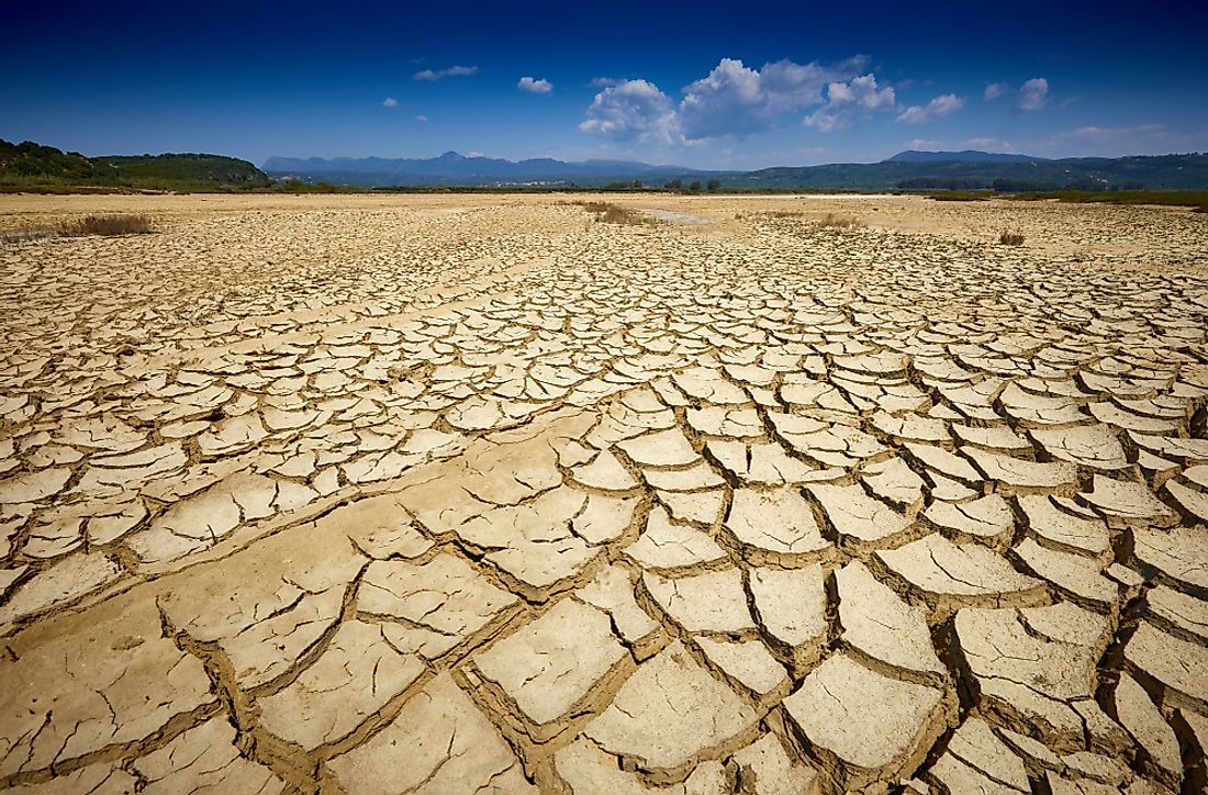 Land dry and cracked in a drought. 