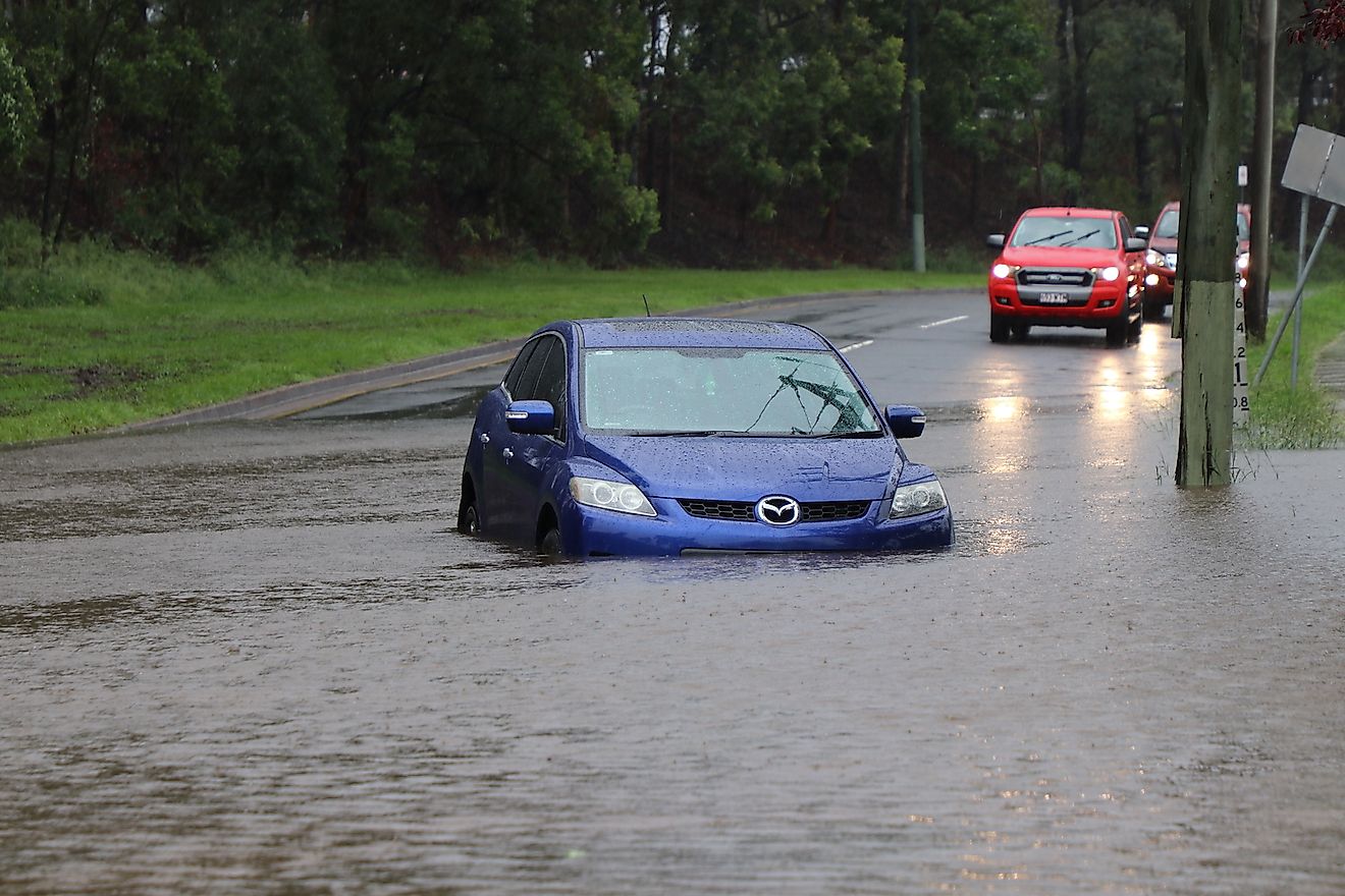 Car stuck in the suburb of Rocklea, Brisbane, Australia in floodwater from huge rainfall as a result of Tropical Cyclone Debbie. Image credit:  Igor Corovic/Shutterstock.com