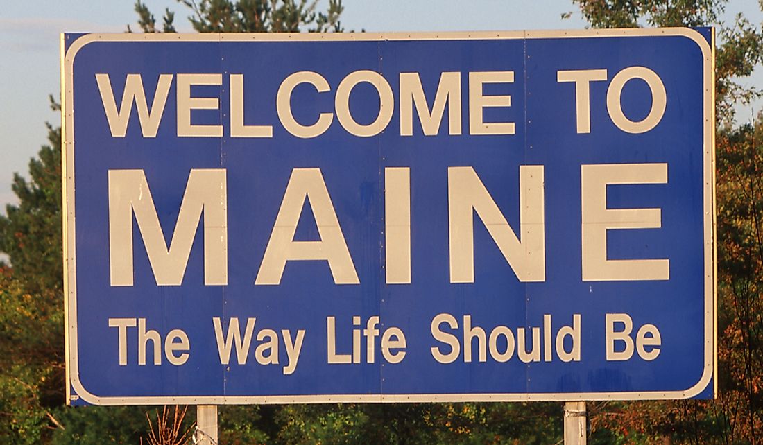 Welcome to Maine road sign. 