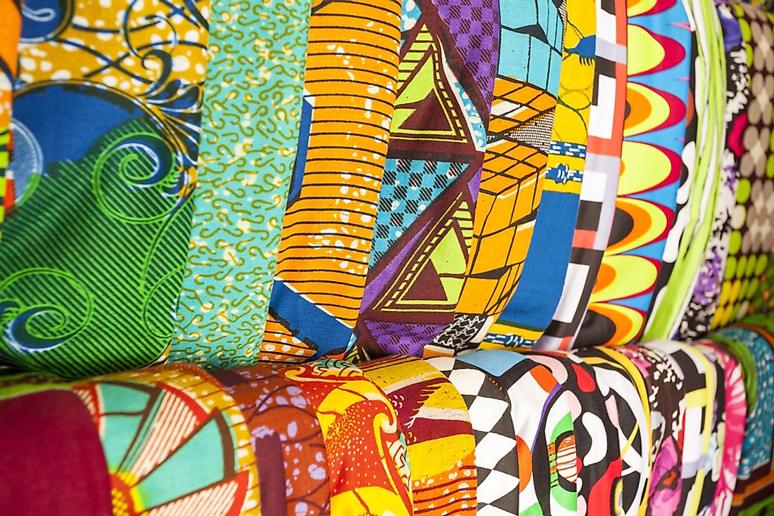 Traditional fabrics sold in a marketplace in Ghana. 