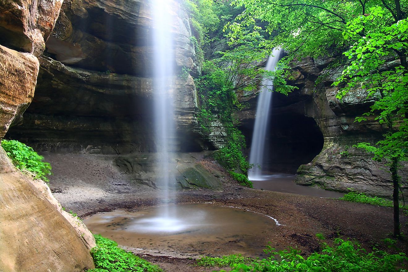 Twin waterfalls crash into Tonti Canyon on a spring day at Starved Rock State Park. Image credit: Jason Patrick Ross/Shutterstock.com