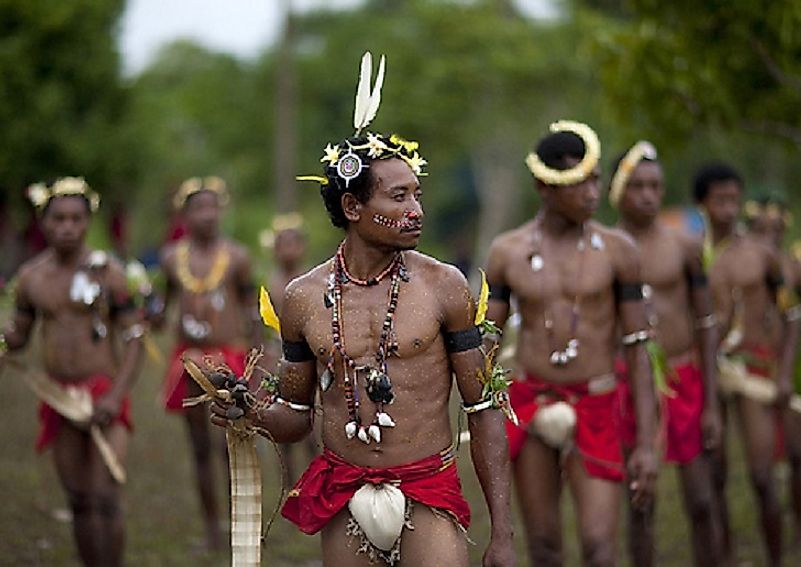 Male Trobrianders taking part in a traditional dancing ritual.