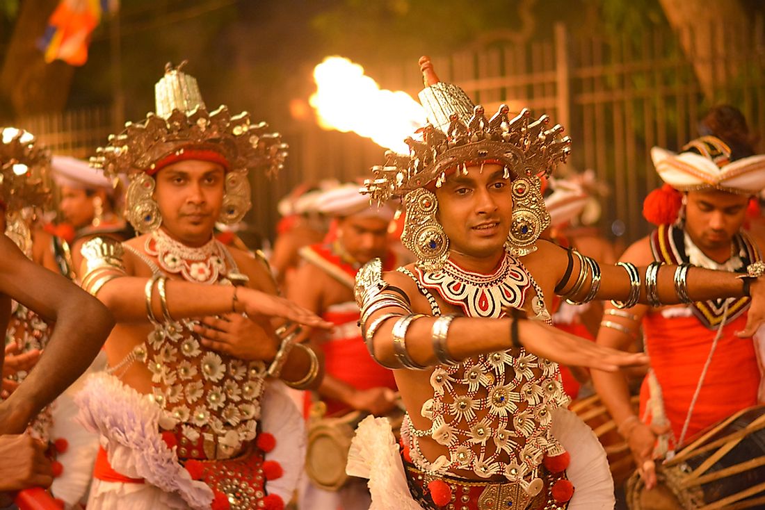 Performers at the Kandy Esala procession in Kandy, Sri Lanka. Editorial credit: SamanWeeratunga / Shutterstock.com.