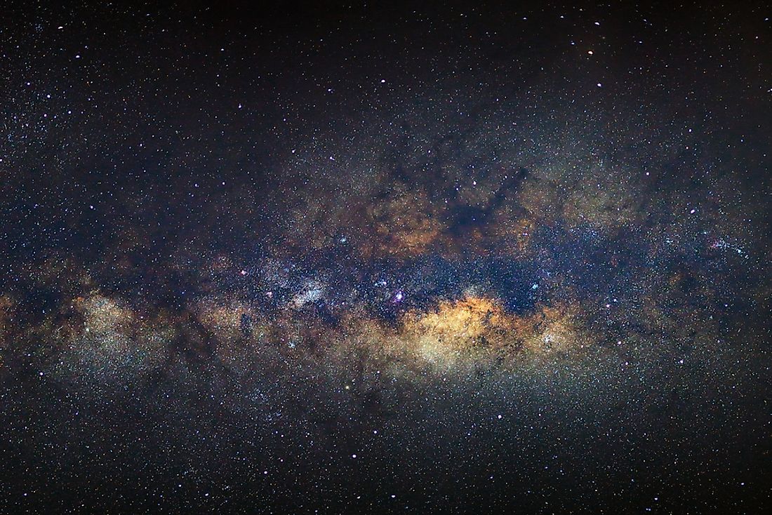 Interstellar dust gives the Milky Way's galactic center a smog-like appearance. 