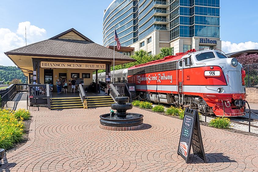 Branson, MO - June 9, 2021: The vintage Branson Scenic Railway passenger train offers an excursion through the foothills of the Ozark Mountains. Departure is from the historic 1905 depot.