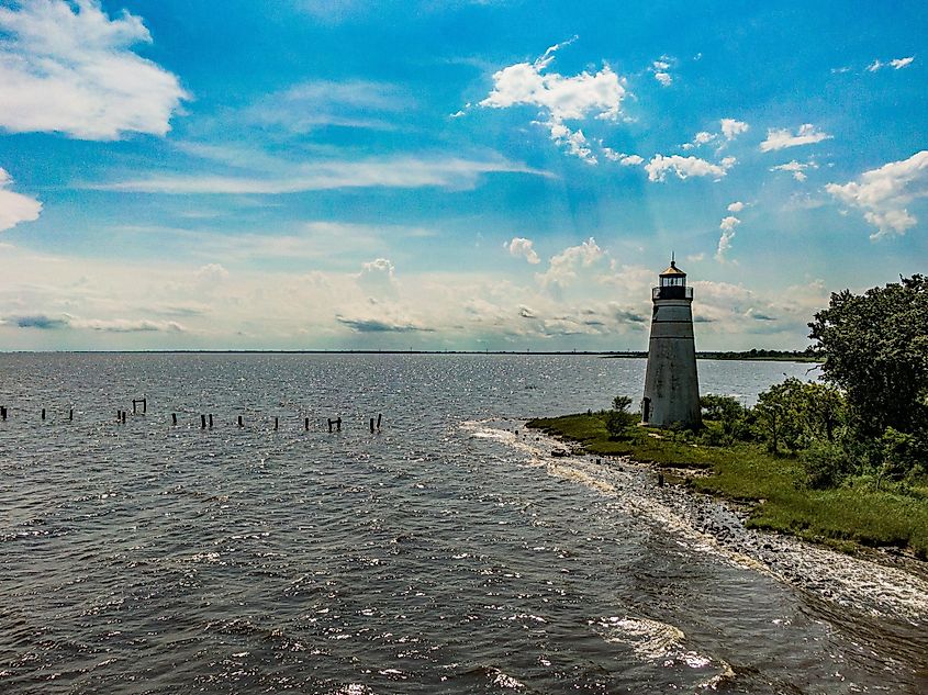 Tchefuncte River Lighthouse overlooking water and beach, Madisonville, Louisiana.