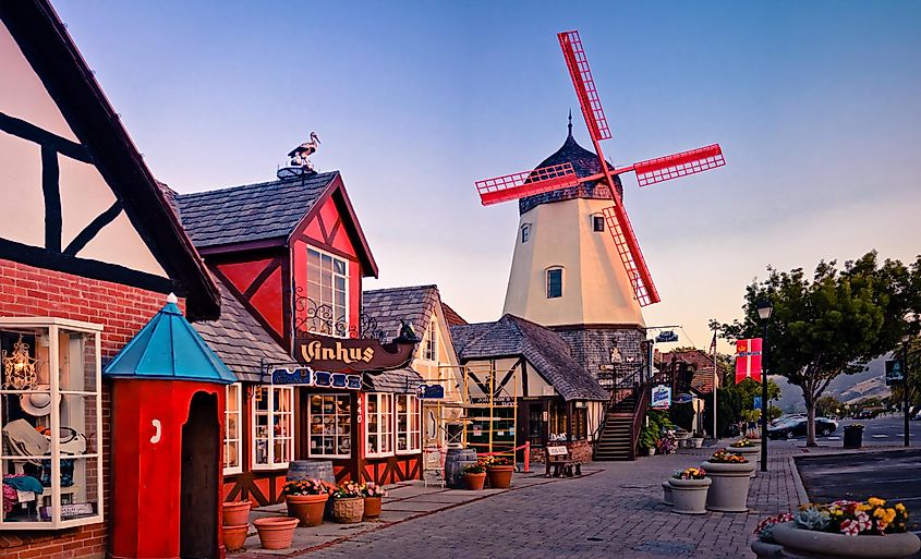 Danish street in Solvang, California, featuring a windmill and a picturesque village landscape.
