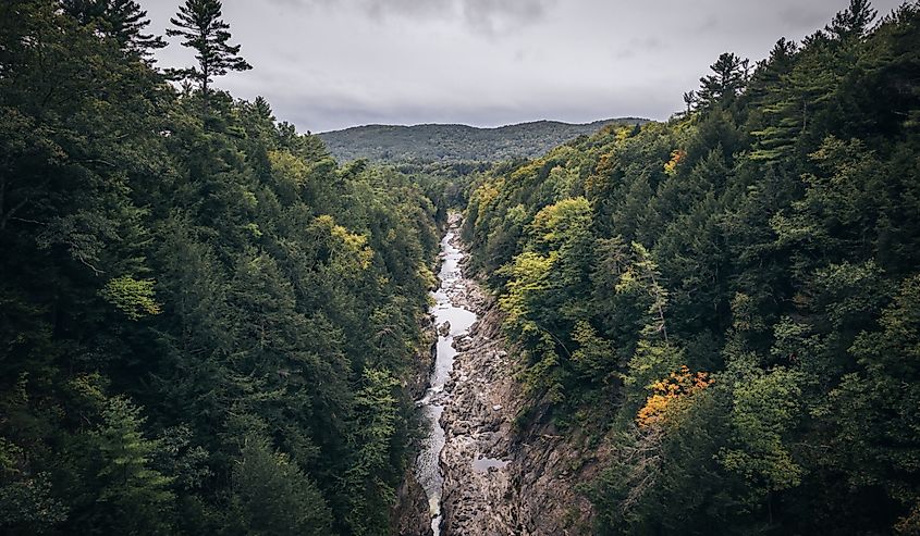 Looking over Quechee Gorge and the Ottaquechee River at the start of fall, Vermont