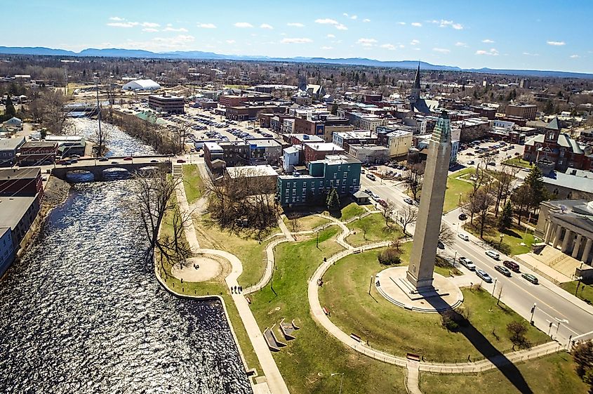 Aerial view of Plattsburgh, New York with the Saranac River flowing through town.