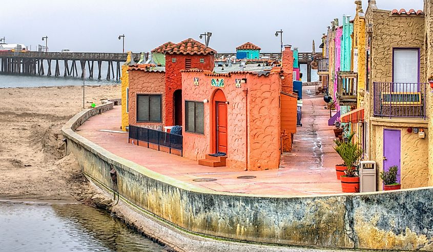 Colorful buildings of Capitola Venetian Hotel and Capitola State Beach.
