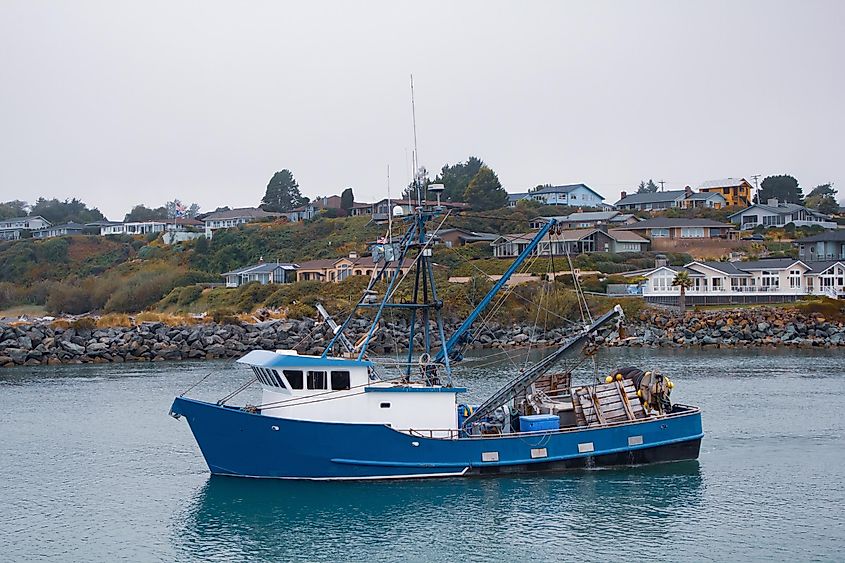 A fishing boat going out to sea in Brookings, Oregon