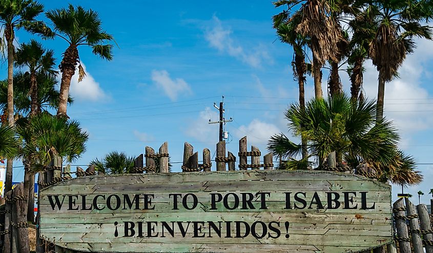 Welcome to Port Isabel sign welcoming beach vacation travelers