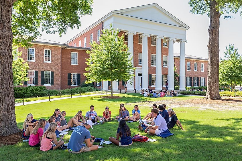 Individuals gathered on the campus of the University of Mississippi in Oxford, MS, USA.