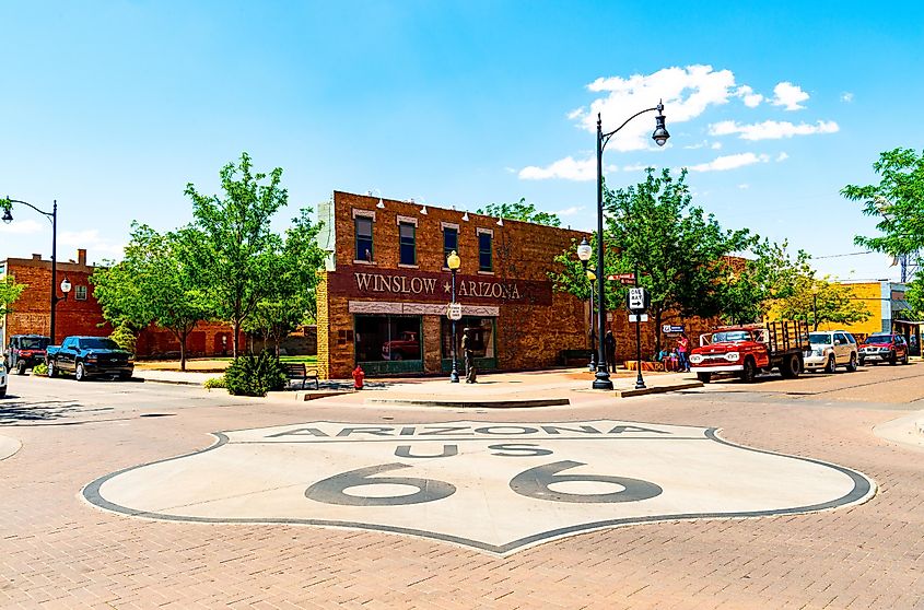 Standing on the corner of Historic Route 66 in Winslow, Arizona