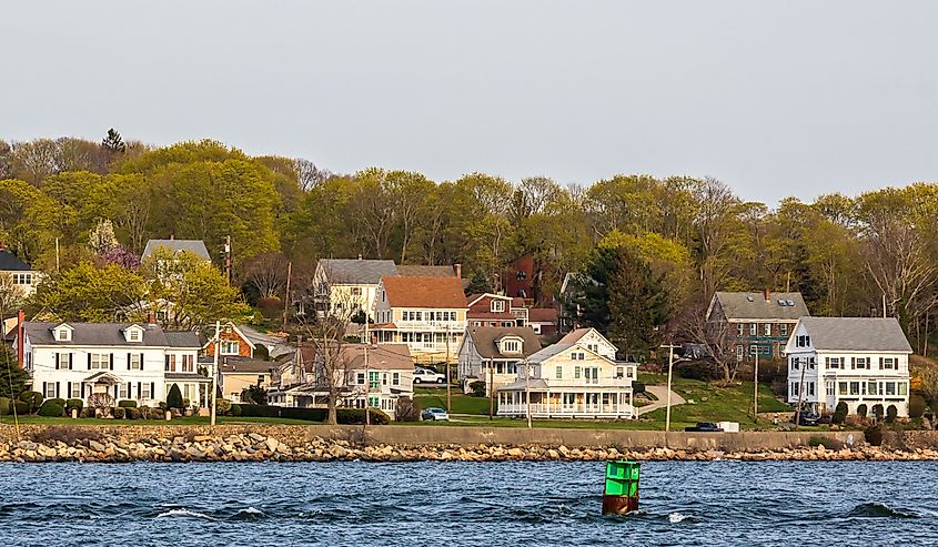 Sakonnet River and a small Tiverton, Rhode Island residential neighborhood.