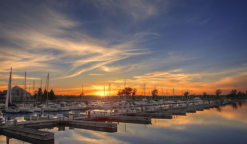 Marina with boats in Winthrop Harbor, Illinois, at sunset.