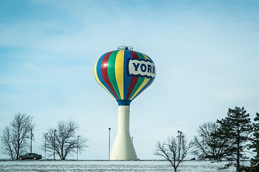 Colorful water tower for York, Nebraska in rainbow colors, resembles a hot air balloon. Editorial credit: melissamn / Shutterstock.com