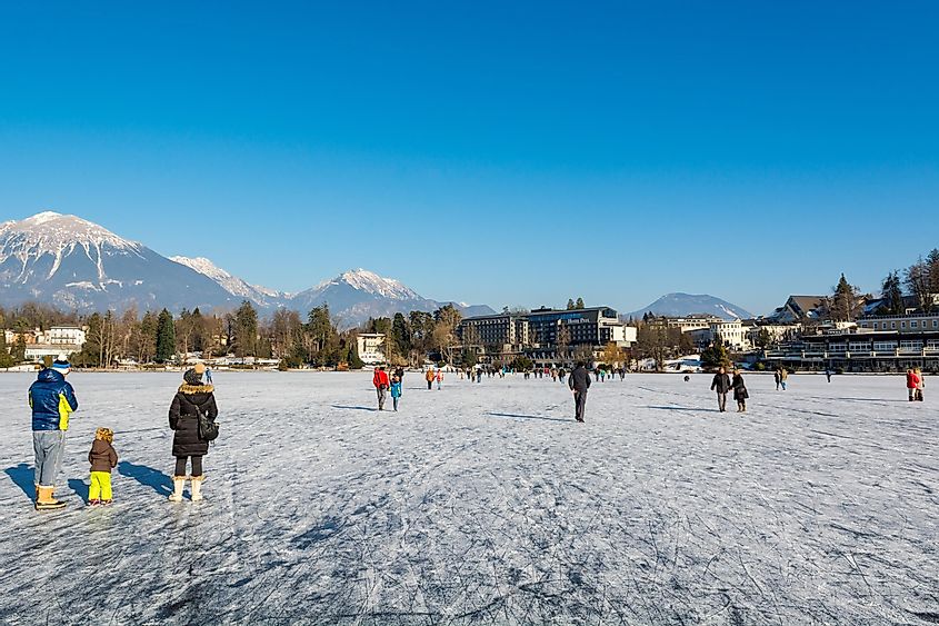 Bled, Slovenia - January 22: People walking on frozen lake, Rare climate event on January 22 2017 in Bled, Slovenia.