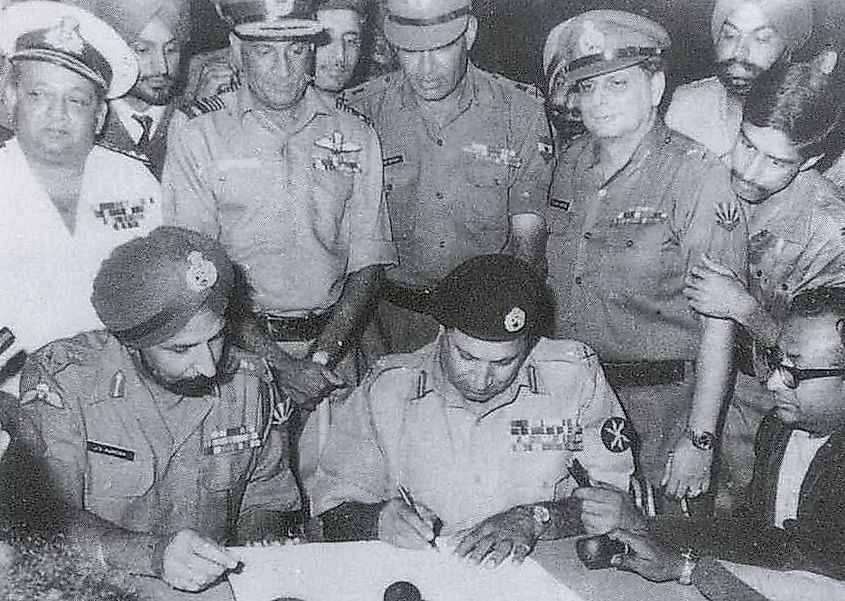 Signing of Pakistani Instrument of Surrender by Pakistan's Lt.Gen. A. A. K. Niazi and Jagjit Singh Aurora on behalf of Indian and Bangladesh Forces in Dhaka on 16 Dec. 1971