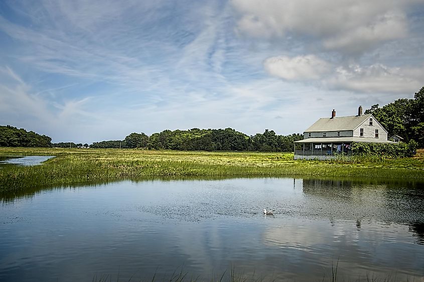 Essex Salt Marsh - an original farm house adds to the beauty of the salt marsh in Essex, Massachusetts.