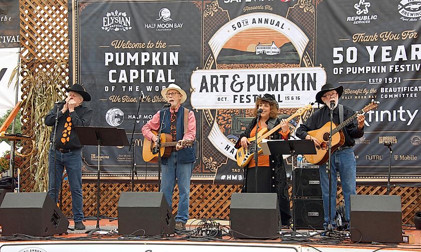 Half Moon Bay, CA - Oct 15, 2022: The Jim Stevens and Friends band playing at the 50th annual Art and Pumpkin Festival on Main Street in the world Pumpkin Capitol of Half Moon Bay, via Sheila Fitzgerald / Shutterstock.com