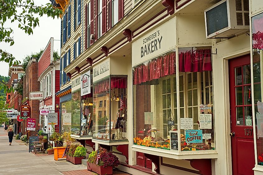 Main Street in Cooperstown, New York, lined with shops, eateries, and baseball-themed attractions, capturing the charm of this upstate New York town.