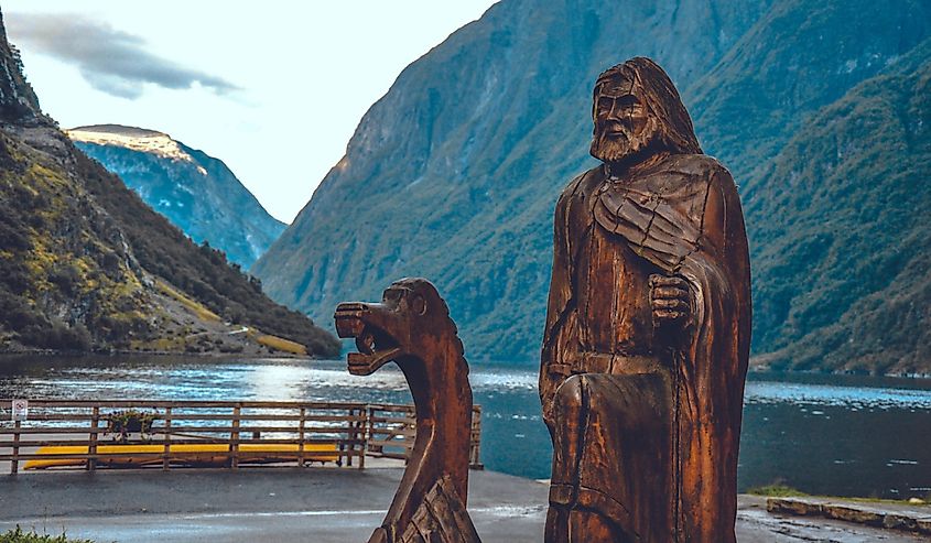 Wooden Viking statue. Viking boat in the village of Gudvangen, the coast of the Nereyfjord, 