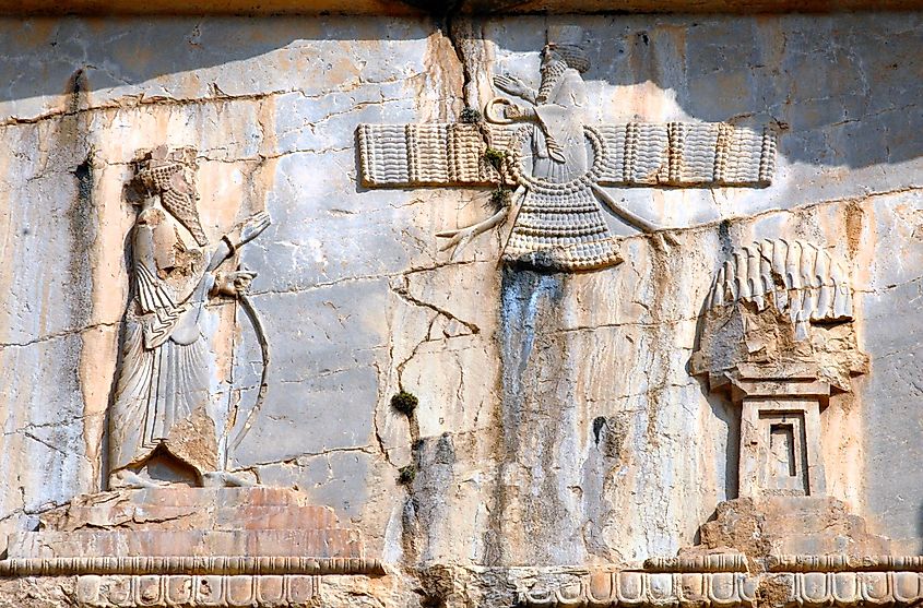 Sassanian stone reliefs in Naqsh-e Rostam (rock tombs of ancient iranian kings Darius III, Artaxerxes I, Darius I and Xerxes I). Iran