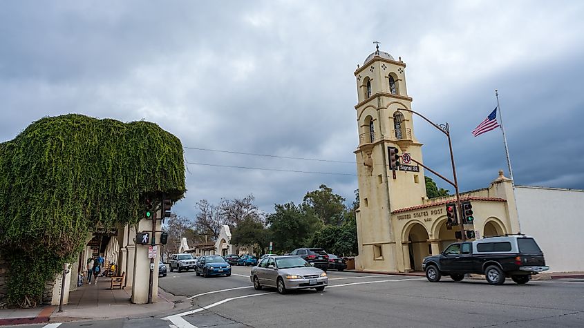 The historic Ojai Post Office along a lively street in Ojai, California.