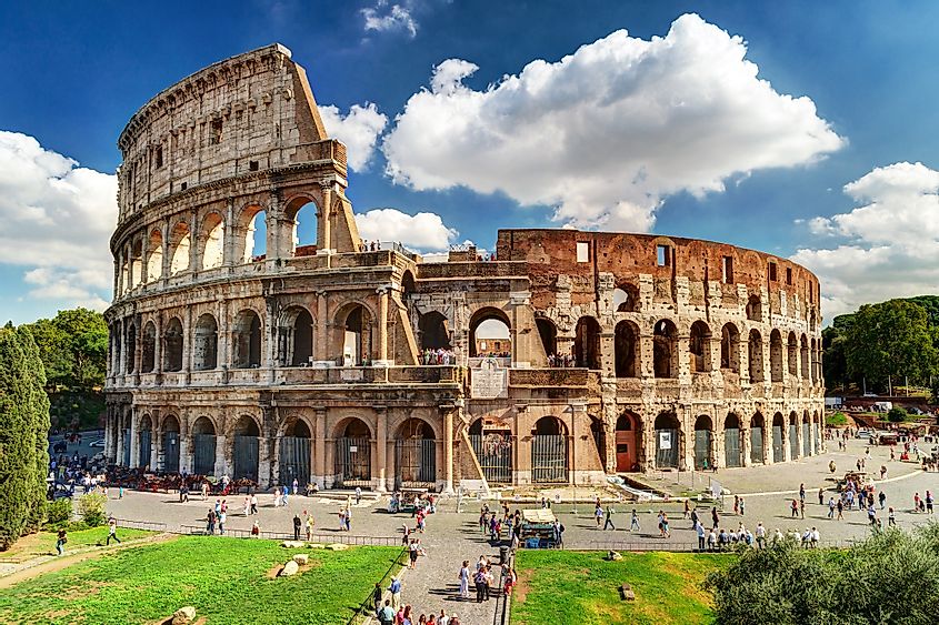 Exterior view of the Colosseum in Rome with people.