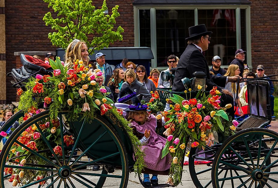 Tulip Time Festival Parade in Pella, Iowa. Image credit yosmoes815 via Shutterstock