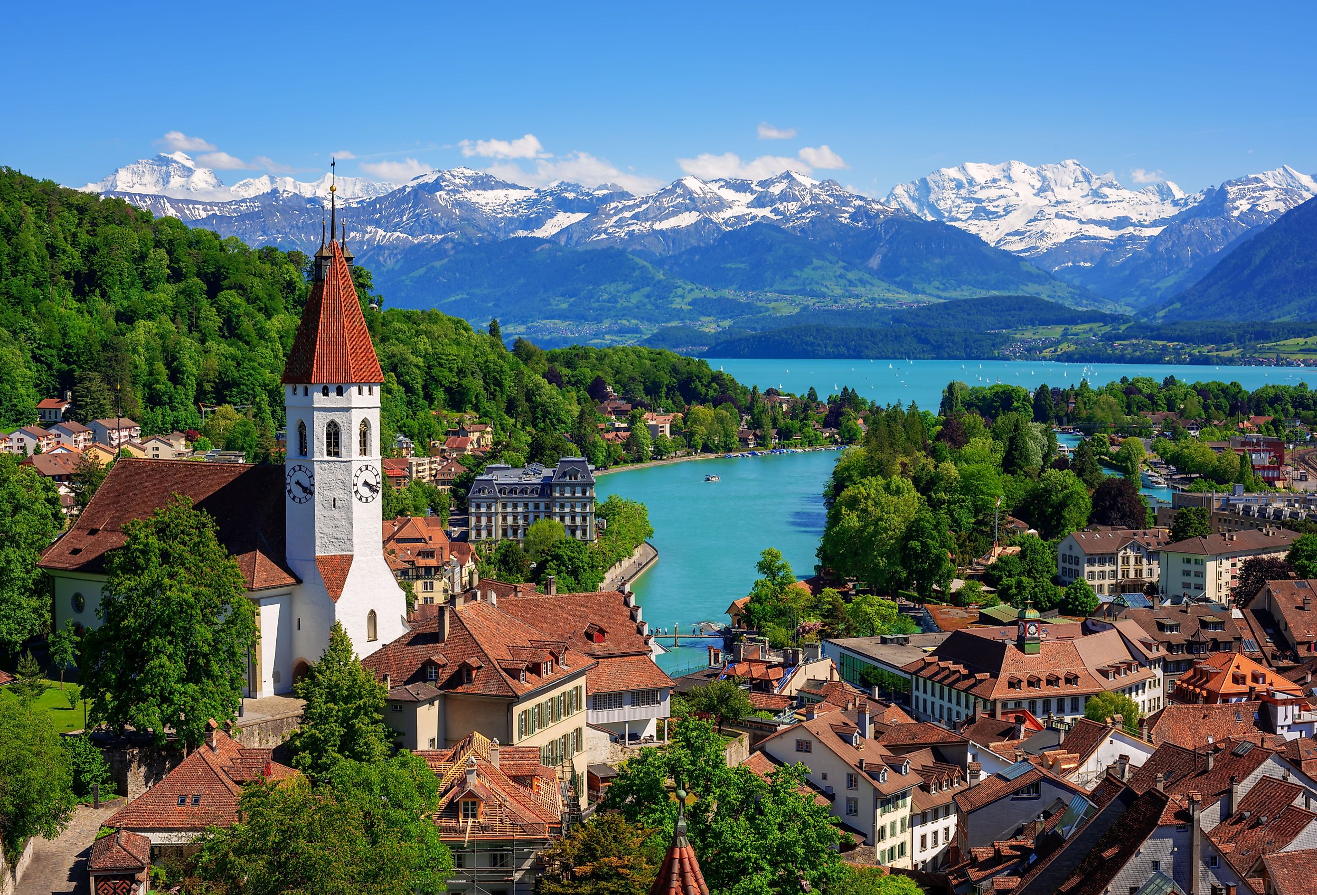 Historical Thun city and Lake Thun with snow covered Bernese Highlands Swiss Alps mountains in background, Canton Bern, Switzerland.