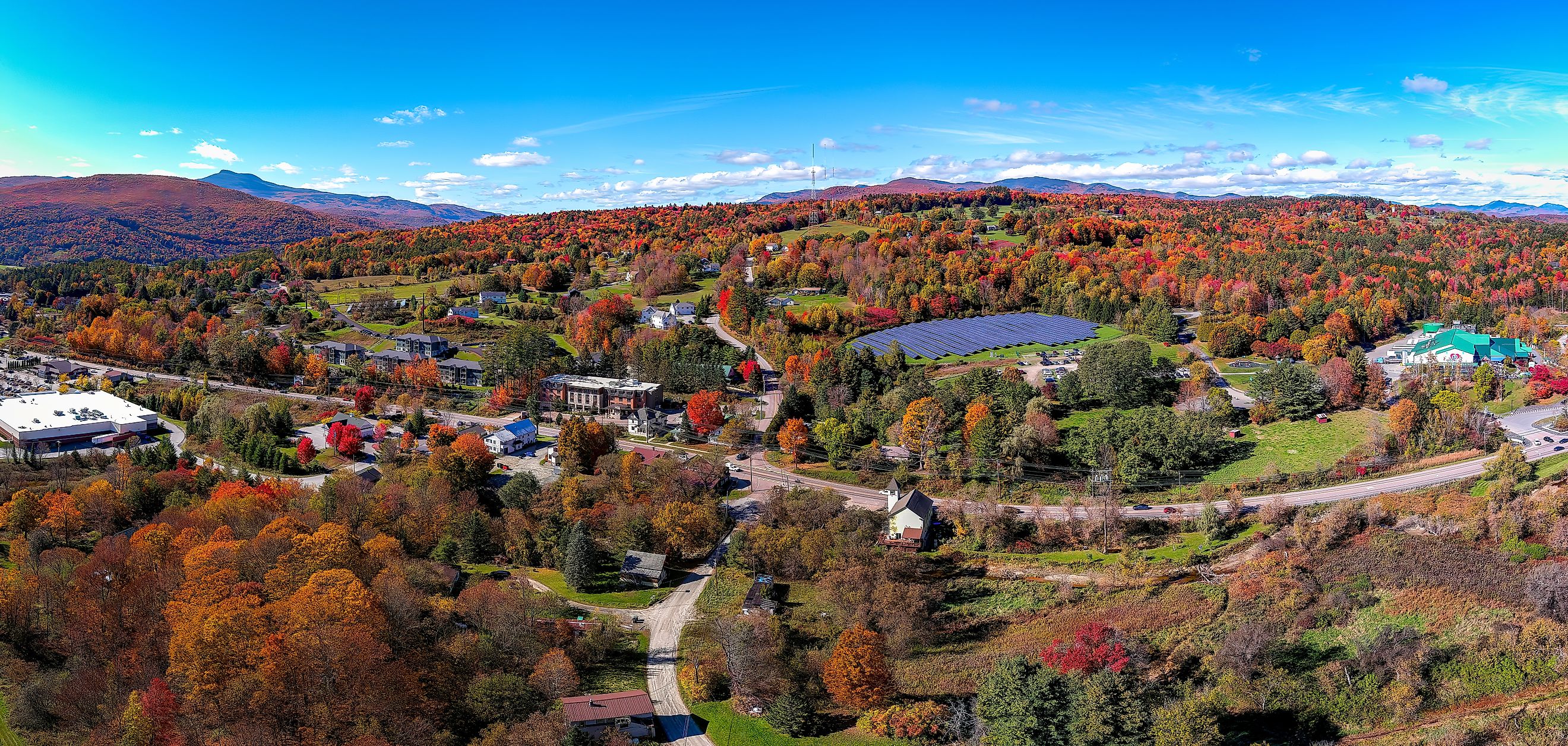 Aerial view of the town and surrounding greenery in Waterbury, Vermont.