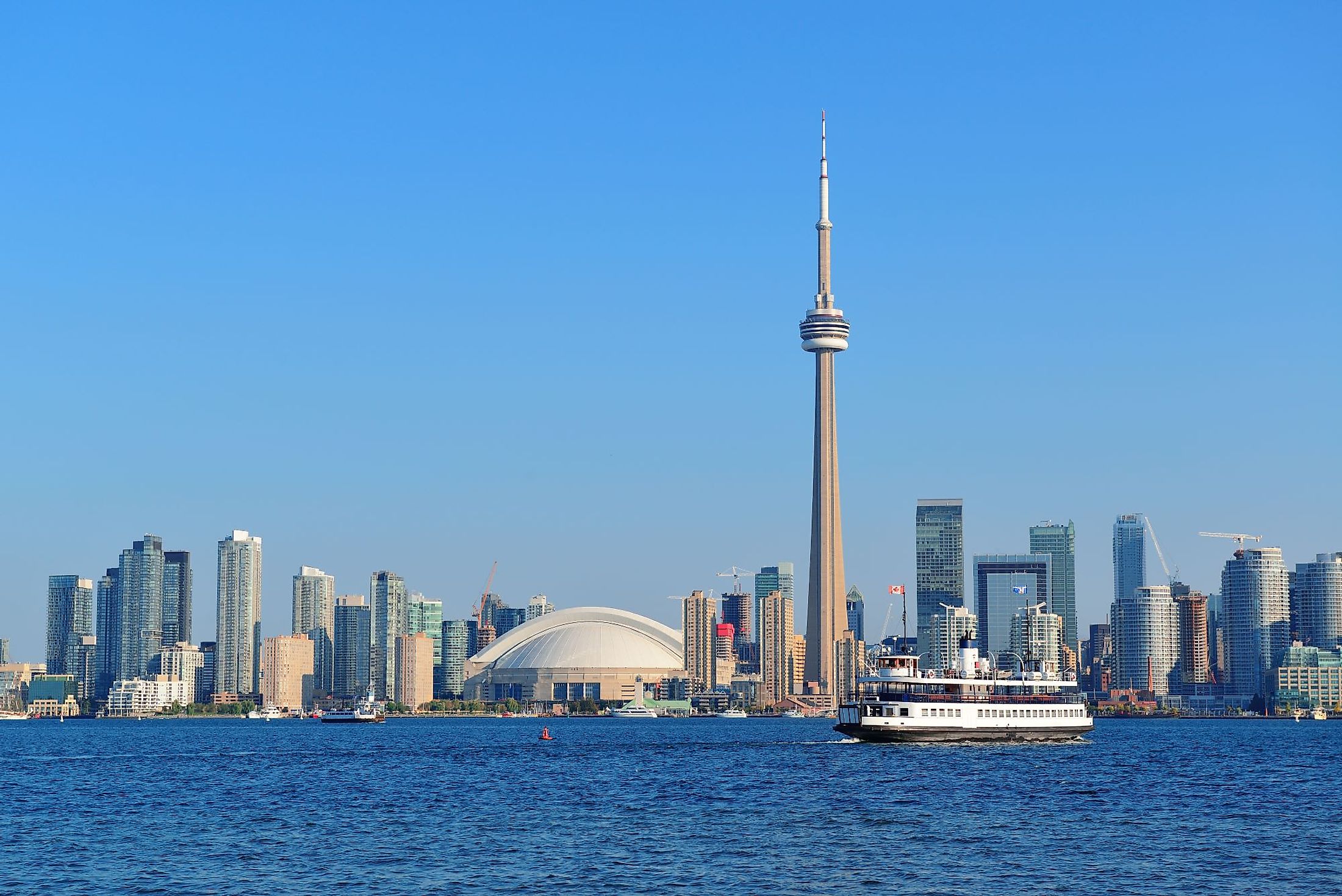 Toronto skyline panorama over Lake Ontario with urban architecture. 