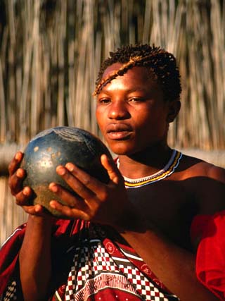Boy Drinking Porridge from Clay Bowl, Mantenga Village, Swaziland