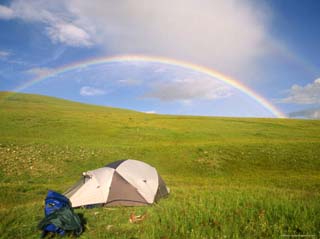 Rainbow Arcs over a Campsite on a Mongolian Steppe