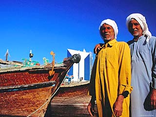 Two Arab Workers in Dhow Harbour, Dubai, United Arab Emirates