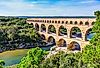 Three-tiered aqueduct Pont du Gard, built in Roman times on the River Gardon.