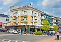 Tourists walk along the sidewalks outside the West Street Hotel in Bar Harbor, via KenWiedemann
