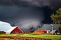 Large tornado passing through a farm between Minden, IA and Harlan, IA