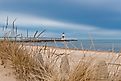 Michigan City lighthouse from Washington Park Beach on a stormy Spring morning. Michigan City, Indiana.